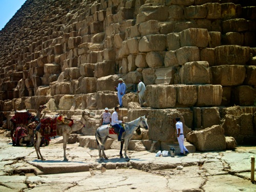 rider next to pyramids